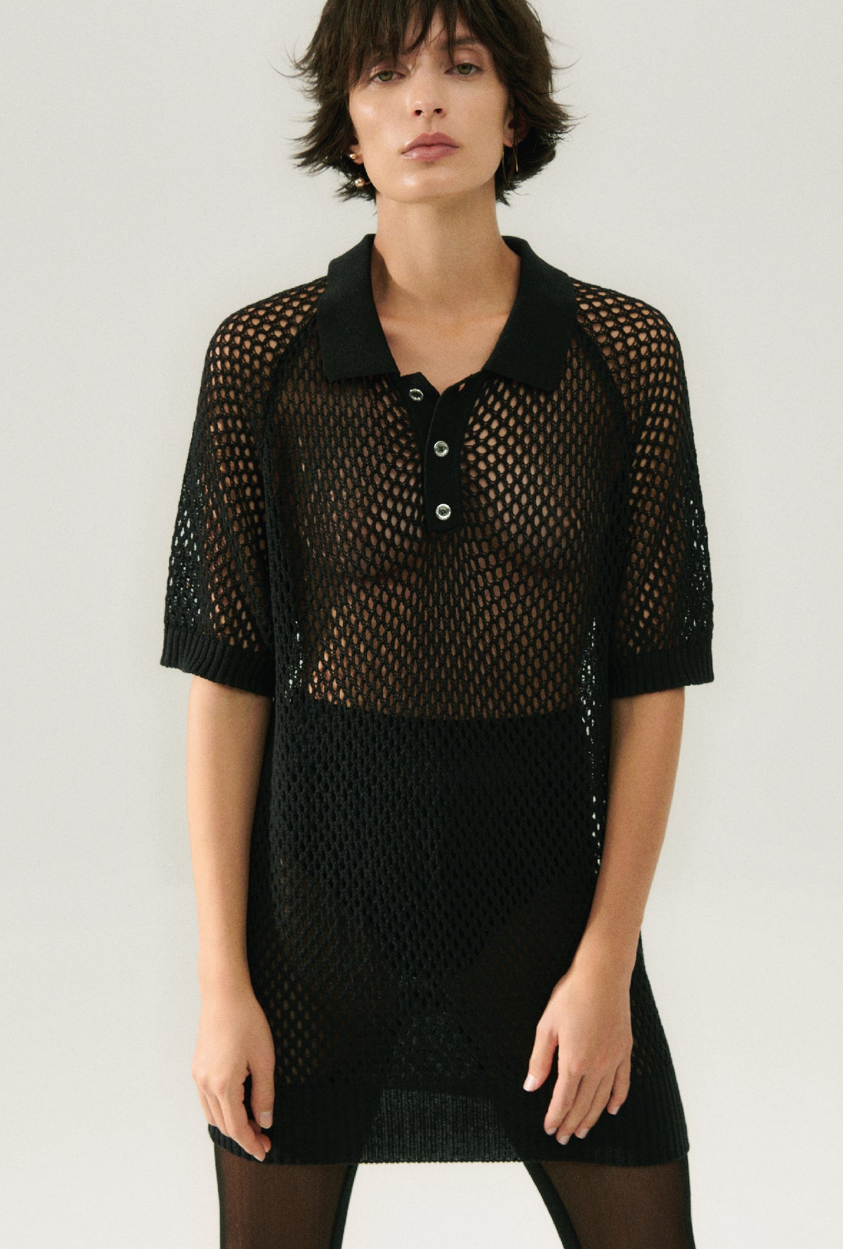 Polo raglan en crochet noir
