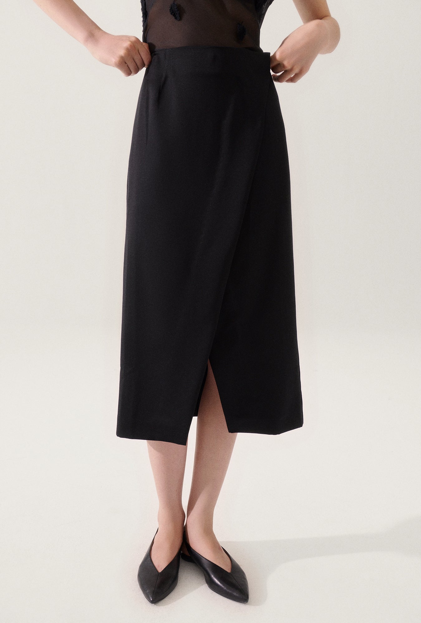 Jupe portefeuille en laine noire